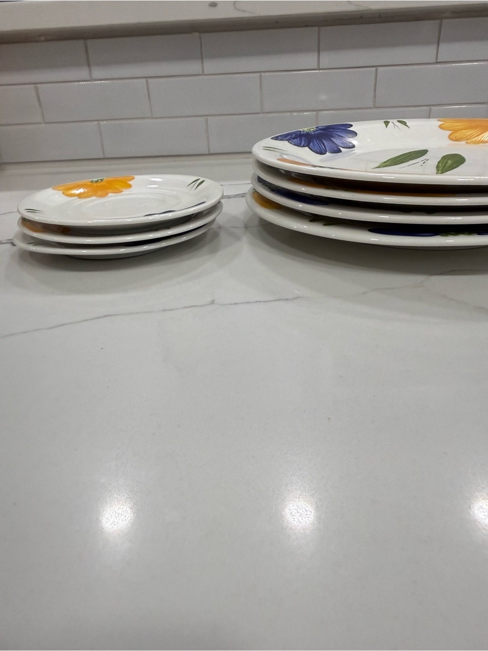 Set of 4 Floral 10” Plates and  3 saucers 5 3/4 “  great condition